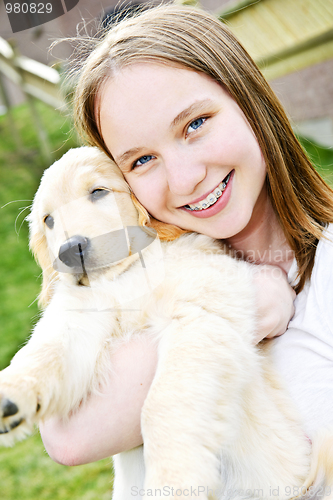 Image of Girl with puppy