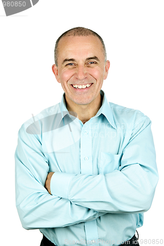 Image of Smiling man with arms crossed