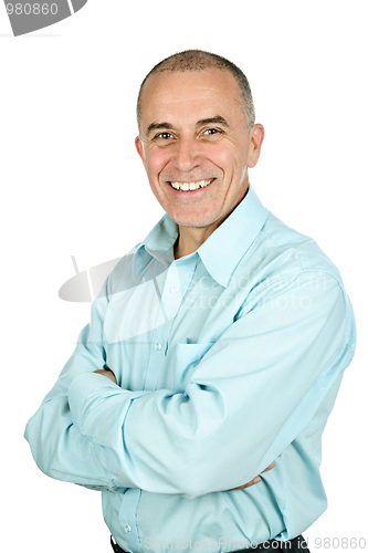 Image of Smiling man with arms crossed