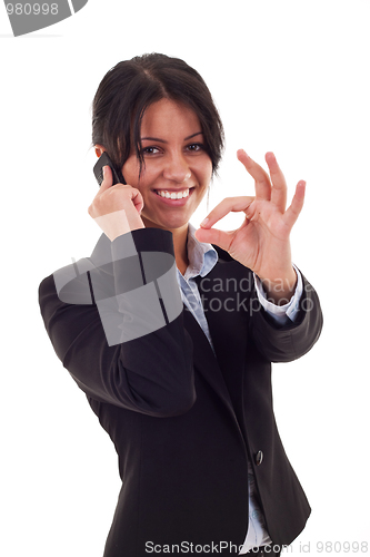 Image of woman with phone and ok sign