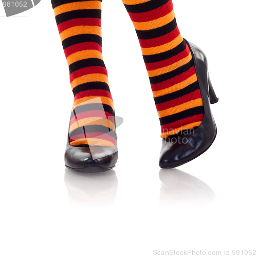 Image of feet wearing colored socks in high heels