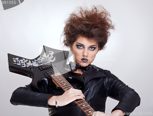 Image of attractive woman guitarist 