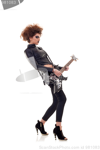 Image of woman with electric guitar