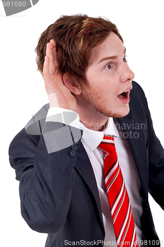 Image of Young businessman  listening