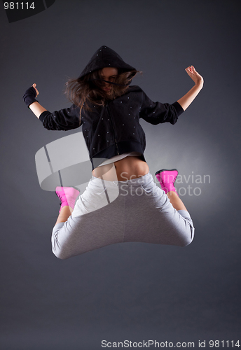 Image of female dancer jumping