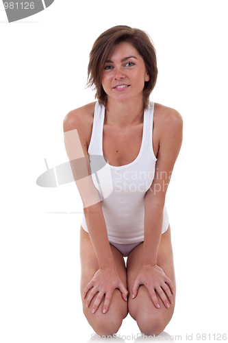 Image of  woman standing on her knees