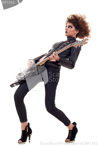 Image of woman playing electric guitar