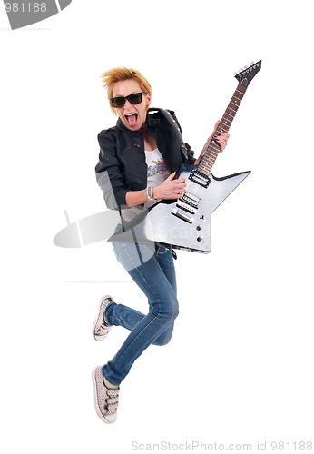 Image of woman guitarist jumping