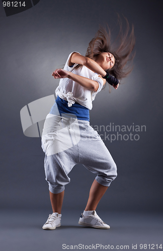 Image of young nice girl dancing