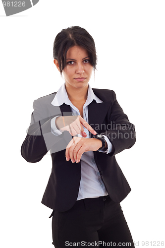 Image of woman pointing her watch