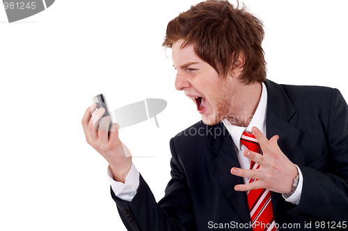 Image of  business man screaming on the phone