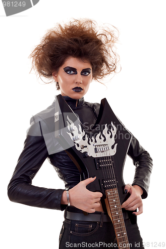 Image of woman holding guitar