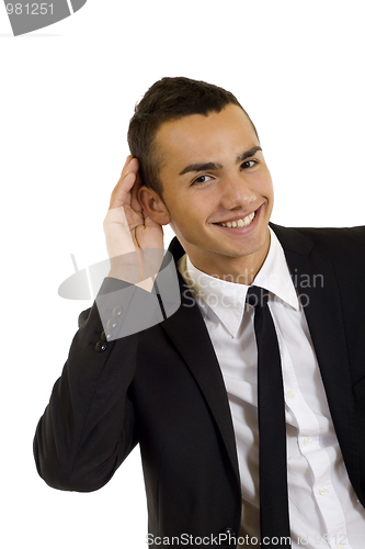 Image of Young business man, listening