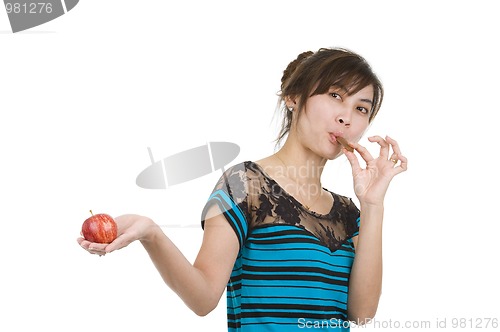 Image of woman with chocolate and apple