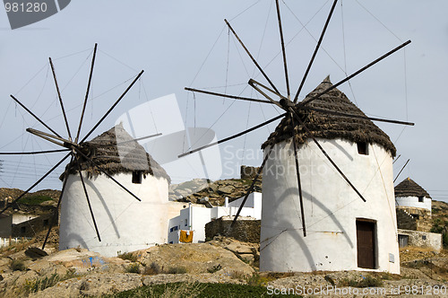 Image of windmill Ios Island Cyclades Greece with thatch roof and white s