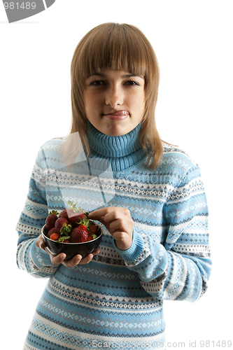 Image of Portrait of the girl with plate of the strawberries
