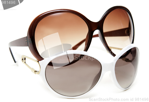 Image of Two sunglasseses white and brown