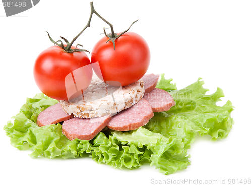 Image of Sandwich with sausage, tomatoes and salad