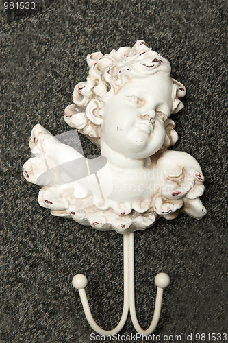 Image of Hatrack in the manner of sculptures of the angel