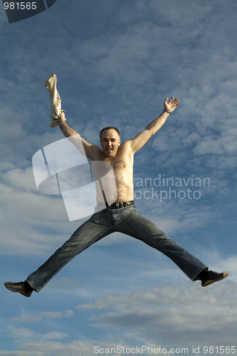 Image of Man jumps on background sky