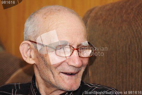 Image of Smiling senior man indoor portrait