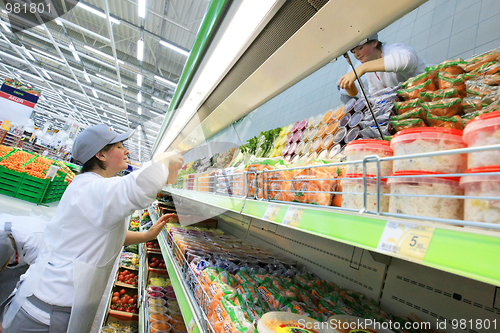 Image of Worker in supermarket