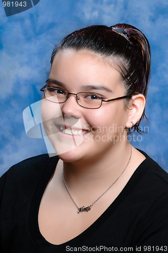 Image of Smiling Girl Head and Shoulder Shot