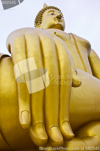 Image of big hand big buddha in thai temple 