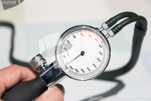 Image of doctor blood pressure