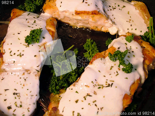 Image of Salmon fried under white sauce