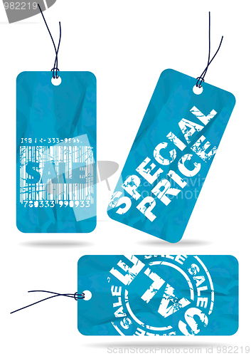 Image of Set of blue crumpled paper tags