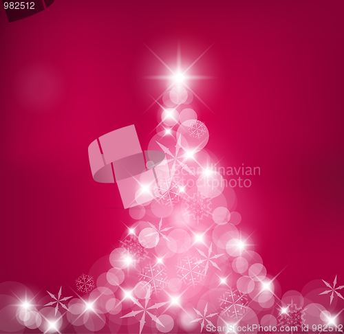 Image of Christmas tree made of light and snow flakes