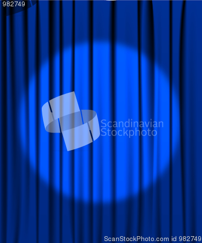 Image of Blue curtain with a spotlight
