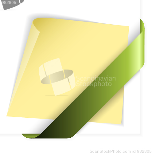Image of Empty green corner ribbon holding yellow paper