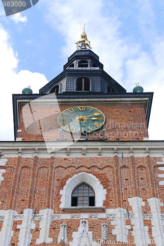 Image of Town hall with clock in summer Krakow