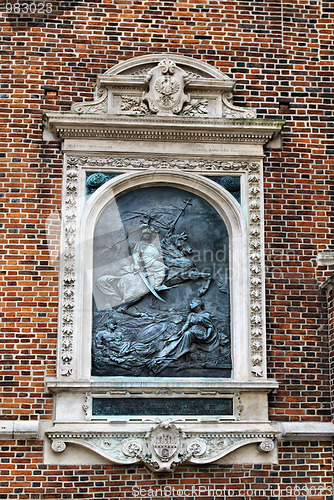 Image of The plaque in the wall of St Mary's Church in Cracow