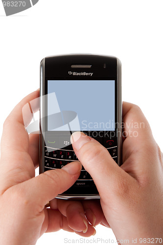 Image of Blackberry smartphone user hands