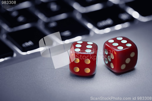 Image of Dice on computer keyboard