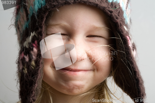 Image of funny girl in winter hat