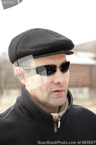 Image of Man in black cap