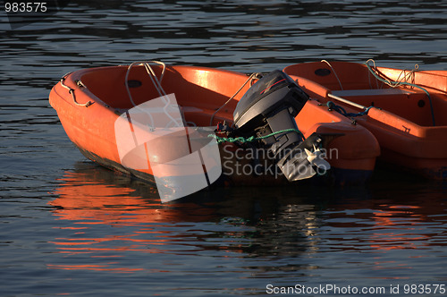 Image of two inflatable boats motor