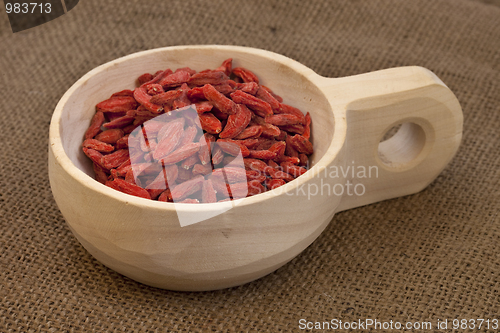 Image of scoop of dried Tibetan goji berries (wolfberries)