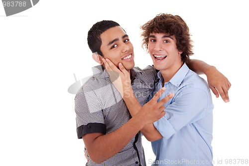 Image of two young men  laughing and hugging