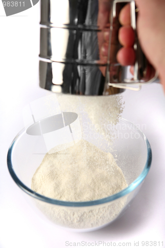 Image of Sifting white flour