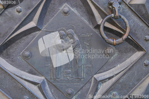 Image of The plaque in the wall of St Mary's Church in Cracow