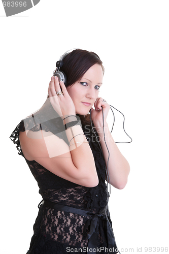 Image of young woman listening headphones