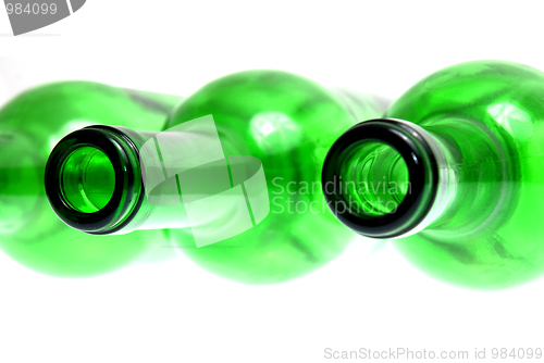 Image of Detail of empty green glass wine bottles