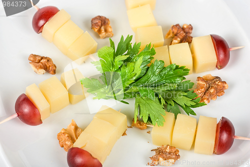 Image of Cheese and grapes and nuts