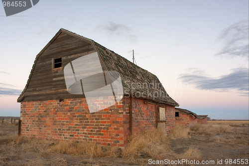 Image of abandoned farm buildings in prairie