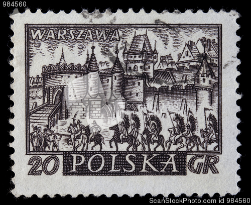 Image of medieval town of Warsaw with hussar cavalry